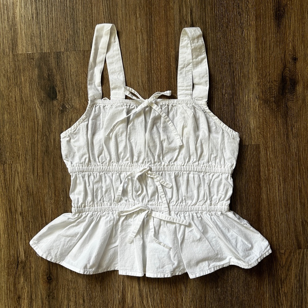 White Sleeveless Peplum Top